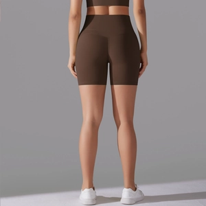 Rear view of coffee brown high-waisted seamless yoga shorts showing sleek athletic fit