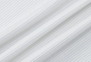 Gros plan de la texture du tissu en maille côtelée blanche avec des motifs verticaux