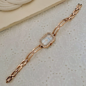 Elegant rose gold square bracelet watch with mother of pearl dial and rhinestone bezel