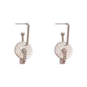 Silver geometric earrings with concentric circle texture and pavé zircon accents