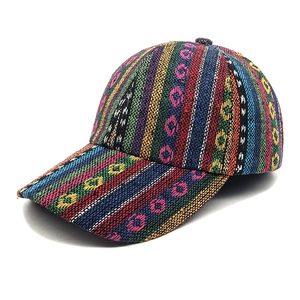 Detailed close-up of the woven bohemian fabric texture on the colorful baseball cap