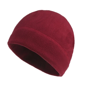 Detail of deep red fleece lining and reinforced stitching on thermal cycling beanie cap