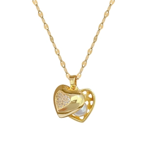 Luxurious gold-plated heart necklace with sparkling rhinestones and hidden white pearl