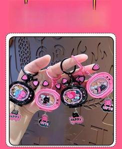 Detail of cute cat TV liquid quicksand keychains with glitter and happy pendants