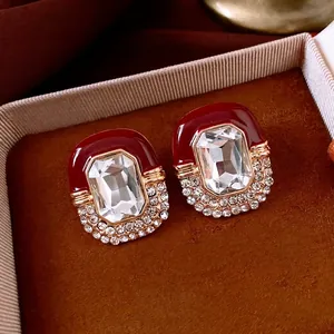 Vintage palace style oval stud earrings with red oil drip and sparkling crystals