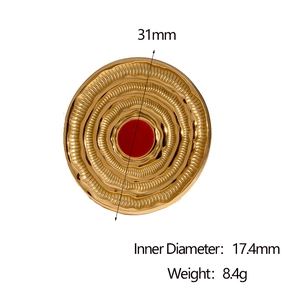 Detail view of 18k gold plated ring with red center and dimensions 31mm and 17.4mm