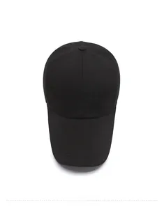 Top view of a black cotton baseball cap with an embroidered silver M logo and six-panel crown