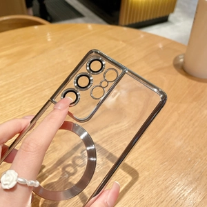 Macro shot of silver plated Magsafe ring and integrated camera lens protector on phone case