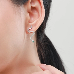 Luxurious S925 silver snake earrings with clear crystals and green gemstone eyes