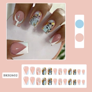 Detail view of BKS2602 press-on nails with floral gold foil and geometric block patterns