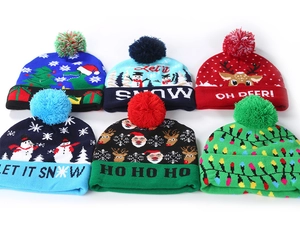 Detailed collection of six festive knitted Christmas hats with colorful LED lights and pom-poms