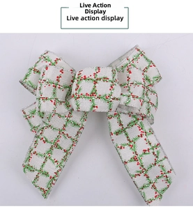 Close-up of linen Christmas bow with pine needle print and silver glitter edges