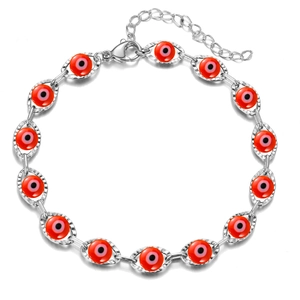 Close-up of red Evil Eye bracelet in silver metal with adjustable lobster clasp