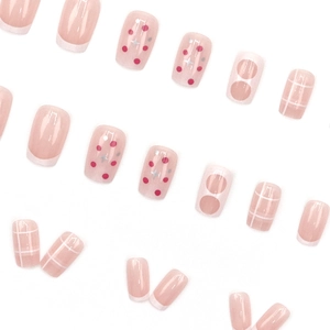 Square press-on nails with French tips, colorful polka dots and plaid pattern designs