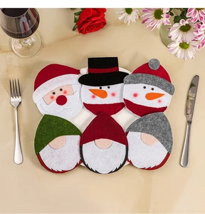 Felt Christmas gnome and Santa table decorations set for a festive dining table arrangement