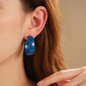 Chic blue resin C-shaped hoop earrings for women with a glossy finish and minimalist design