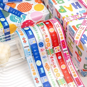 Colorful graduation gift ribbons with motivational text for school gift wrapping and decor