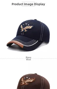 Detail of baseball cap featuring eagle embroidery and brown leather trim on brim