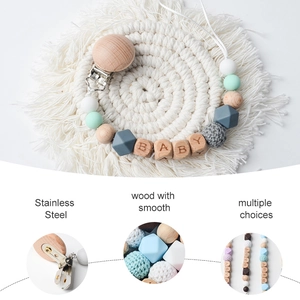 Beech wood and silicone baby pacifier clip with BABY letter beads and stainless steel clamp