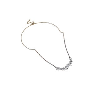 Elegant silver wheat ear necklace with clear zircon stones on a white background