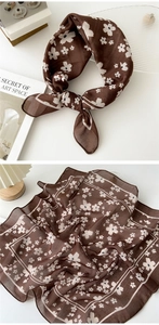 Close-up of brown cotton linen square scarf with white cherry blossom floral print