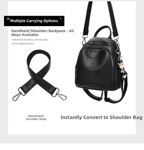 Detail of black faux leather mini backpack with detachable strap and cute calf charm