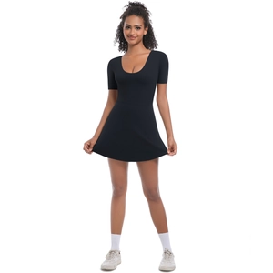 Detail of a black tennis bodysuit dress featuring short sleeves and a slim-fit waist design