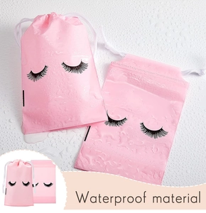 Detail of waterproof pink EVA eyelash drawstring bag showing water resistance on surface