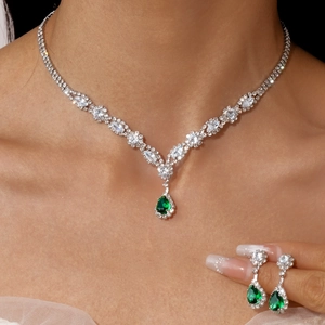 Luxury silver-tone jewelry set with teardrop emerald zircon necklace and earrings