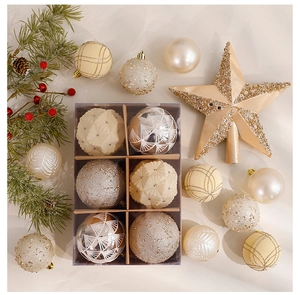 Detail of champagne and cream Christmas tree ornaments with star topper and glitter texture