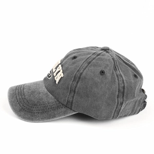 Detailed macro view of retro washed cotton baseball cap with 3D NYC embroidery
