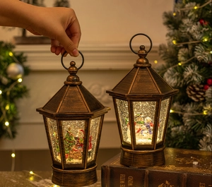 Close-up of vintage bronze Christmas lantern with LED light and spinning glitter