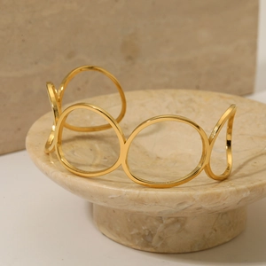 Elegant gold-plated stainless steel open oval bracelet with multilayered hollow ring design