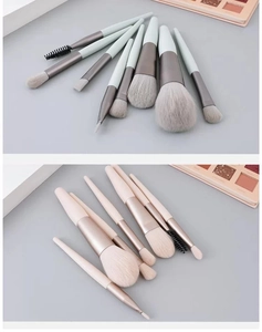 Detail view of 8-piece portable makeup brush set in mint green and soft pink variants