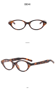 Detailed front and side view of tortoiseshell eyewear frames with demi patterns