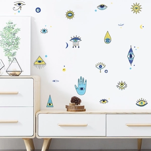 Bohemian wall stickers featuring evil eye and sun patterns in a modern living room decor