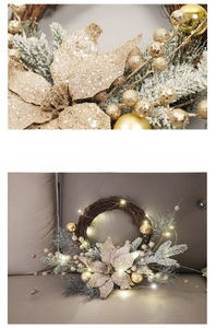 Detail of Christmas wreath with pine needles, golden ornaments, and integrated LED lights