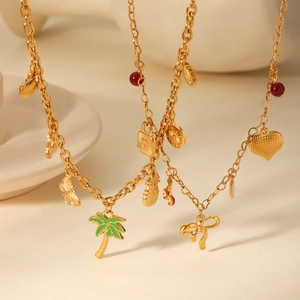 Gold stainless steel charm necklace with tropical coconut tree and fruit pendants