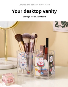 Clear acrylic makeup brush holder with cute cartoon stickers for desk organization