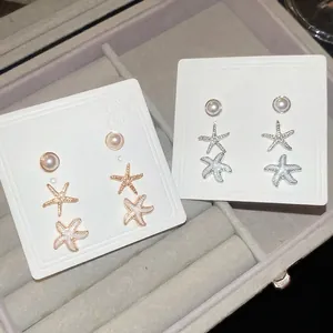 Elegant six-piece starfish and pearl stud earring set in rose gold and silver finishes