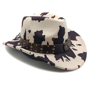 Detailed view of western cow print felt hat featuring leather band and metal buckle