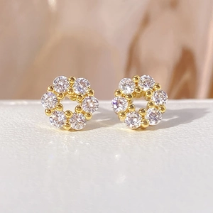 Elegant gold-plated flower stud earrings featuring sparkling white zircon accents for women