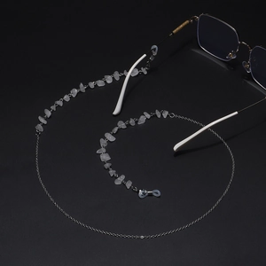 Detail of silver chain eyewear strap with translucent white quartz stone beads and silicone loops