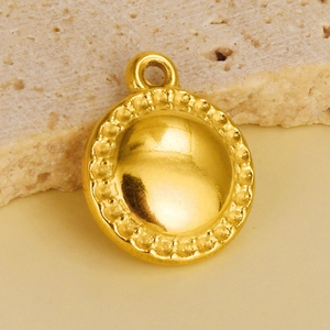 Detailed macro view of a 304 stainless steel gold-plated round pendant with beaded edges