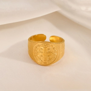 Golden St. Benedict cross religious ring with embossed details and textured band
