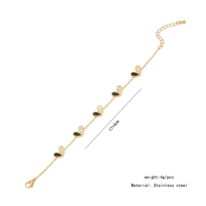 Detail of stainless steel gold bracelet with size 17+4cm and heart pendant feature