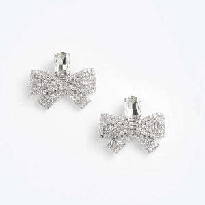 Sparkling crystal bow tassel earrings in silver finish with long rhinestone fringes