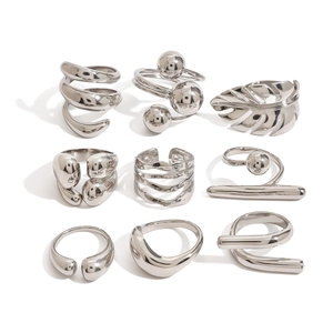 9-piece set of minimalist silver stainless steel geometric rings with organic shapes