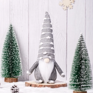 Gray knitted gnome figurine with white beard on wood base for Christmas decor