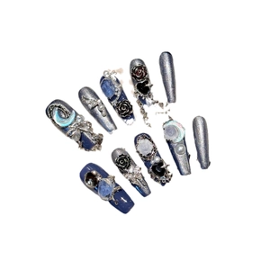 Handmade press-on nails in deep blue and silver with 3D roses, pearls, and moon gems